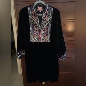 Beautiful velvet Johnny was black dress with gorgeous embroidery on dress.